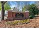 Westside Condominiums brick entrance sign surrounded by landscaping at 1975 Nocturne Dr # 2303, Alpharetta, GA 30009
