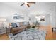 Inviting living room showcasing open floor plan, kitchen access, and modern decor at 1975 Nocturne Dr # 2303, Alpharetta, GA 30009