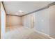 Spacious finished basement area with neutral carpet and plenty of room for activities at 7933 Heathmore Dr, Fairburn, GA 30213