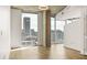 Bright living space with large windows offering city views, showcasing the natural light and open floor plan at 860 Peachtree Ne St # 2209, Atlanta, GA 30308