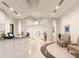 The lobby features a modern design with columns and plenty of seating at 860 Peachtree Ne St # 2209, Atlanta, GA 30308