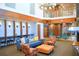 Modern lobby features a spiral staircase, workspace and cozy seating at 860 Peachtree Ne St # 2209, Atlanta, GA 30308