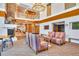 Community lounge with fireplace, spiral staircase, seating area, and pool table at 860 Peachtree Ne St # 2209, Atlanta, GA 30308