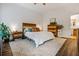 Bright bedroom with wood flooring, a ceiling fan, and a view of the backyard at 1635 Briarcliff Rd # 8, Atlanta, GA 30306