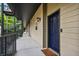 Apartment exterior featuring a walkway with black metal railings and a blue door with the number 8 at 1635 Briarcliff Rd # 8, Atlanta, GA 30306
