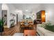 Bright living room featuring an open floor plan, wood floors, and modern decor at 1635 Briarcliff Rd # 8, Atlanta, GA 30306