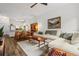 Bright living room featuring an open floor plan, white couch, and modern decor at 1635 Briarcliff Rd # 8, Atlanta, GA 30306
