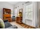 Cozy living room featuring an area rug, natural light, and vintage furniture at 1635 Briarcliff Rd # 8, Atlanta, GA 30306