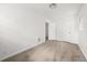 Bright bedroom offers neutral walls, plush carpeting, and closet with bi-fold doors at 37 S Forty W Pass, Hiram, GA 30141