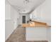 Well-lit kitchen featuring white cabinets, laminate countertops, and tile flooring at 37 S Forty W Pass, Hiram, GA 30141