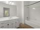 Bright bathroom with a tiled shower and a vanity at 3818 Sweet Bottom Dr, Duluth, GA 30096