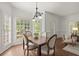 Charming dining room featuring natural light and classic decor, ideal for intimate dinners at 3818 Sweet Bottom Dr, Duluth, GA 30096