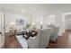 Bright living room with neutral tones, hardwood floors, and elegant decor, perfect for entertaining at 3818 Sweet Bottom Dr, Duluth, GA 30096