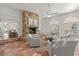 Comfortable sun room features a stone fireplace, tile floors, and lots of natural light at 3818 Sweet Bottom Dr, Duluth, GA 30096