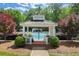 Tennis courts featuring a covered gazebo and pathway at 3818 Sweet Bottom Dr, Duluth, GA 30096