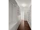 Bright walk-in closet with custom shelving and drawers for ample storage space at 3818 Sweet Bottom Dr, Duluth, GA 30096
