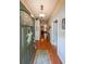 Inviting entryway with hardwood floors, neutral paint, and decorative accents that create a warm and welcoming atmosphere at 4872 Nature Trl, Austell, GA 30106