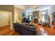 Cozy living room with hardwood floors, neutral colors, and plenty of natural light at 4872 Nature Trl, Austell, GA 30106