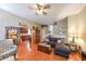 Open-concept living area, seamlessly blending a cozy living room with an adjacent dining space and a modern kitchen at 4872 Nature Trl, Austell, GA 30106