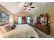 Spacious main bedroom with vaulted ceilings, a ceiling fan, and a walk-in closet at 4872 Nature Trl, Austell, GA 30106