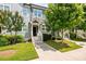 Charming townhome featuring a well-maintained lawn, inviting entrance, and beautiful curb appeal at 1381 Wallace Walk, Atlanta, GA 30316