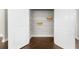 Organized pantry with white shelving and two decorative baskets at 1381 Wallace Walk, Atlanta, GA 30316