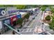 Overhead shot of a busy commercial street, emphasizing a vibrant mix of storefronts and traffic at 1381 Wallace Walk, Atlanta, GA 30316