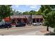 Street-side view of commercial building, highlighting front design, parking, and signage for business at 1381 Wallace Walk, Atlanta, GA 30316