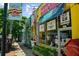 Street view of businesses featuring unique and vibrant architecture in a bustling location at 1381 Wallace Walk, Atlanta, GA 30316