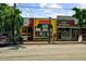 Street view of businesses featuring unique and vibrant architecture in a bustling location at 1381 Wallace Walk, Atlanta, GA 30316