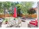 A delightful patio setting with comfortable seating, perfect for outdoor relaxation and entertainment at 1563 Country Wood Dr, Hoschton, GA 30548