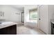 Bright bathroom featuring a standalone tub, granite countertops, and shower stall at 2470 Day Break Way, Dacula, GA 30019