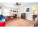 Neutral bedroom featuring carpet, natural light, and a bathroom access at 2470 Day Break Way, Dacula, GA 30019