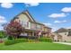 Beautiful two-story brick home with a well-maintained lawn and mature landscaping at 2470 Day Break Way, Dacula, GA 30019