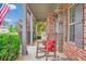 Charming front porch with rocking chair and red accents, perfect for relaxing at 2470 Day Break Way, Dacula, GA 30019