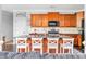 Well-equipped kitchen featuring a functional island with barstool seating at 2470 Day Break Way, Dacula, GA 30019