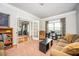 Inviting living room boasts ample seating, and an open view to an adjacent dining area at 2470 Day Break Way, Dacula, GA 30019