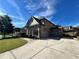 Beautiful brick home with a two-car garage, separate one-car garage, and concrete driveway at 2506 Monta Vista Way, Hoschton, GA 30548