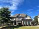 Charming two-story home featuring a well-manicured lawn and professional landscaping in a desirable neighborhood at 2506 Monta Vista Way, Hoschton, GA 30548