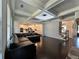 Spacious living room highlighting coffered ceilings and open layout to kitchen at 2506 Monta Vista Way, Hoschton, GA 30548
