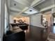 Living room view with coffered ceilings and easy access to kitchen and stairs at 2506 Monta Vista Way, Hoschton, GA 30548