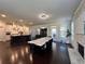 Open concept living space including kitchen, dining, and living rooms, perfect for entertaining friends and Gathering at 2506 Monta Vista Way, Hoschton, GA 30548