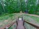 Spacious backyard with a playset and trampoline, perfect for outdoor fun and relaxation at 2700 Sam Nelson Rd, Canton, GA 30114