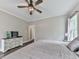Comfortable bedroom with neutral colors, ceiling fan, and wood-look floors at 2700 Sam Nelson Rd, Canton, GA 30114