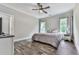 Cozy bedroom with a comfortable bed, neutral colors, and a ceiling fan at 2700 Sam Nelson Rd, Canton, GA 30114