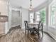 Bright dining nook with large windows, seating for four, and modern fixtures for a cozy meal at 2700 Sam Nelson Rd, Canton, GA 30114