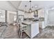 Modern kitchen with stainless steel appliances, island seating, and open concept design for entertaining at 2700 Sam Nelson Rd, Canton, GA 30114