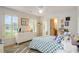 Bright bedroom with natural light, plantation shutters, and charming decor at 374 Beaumont Farms Dr, Sharpsburg, GA 30277