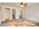 Bedroom with plush carpet, and unique colorful accent rug at 374 Beaumont Farms Dr, Sharpsburg, GA 30277