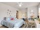 Playful bedroom with natural light, modern decor and stylish carpet at 374 Beaumont Farms Dr, Sharpsburg, GA 30277